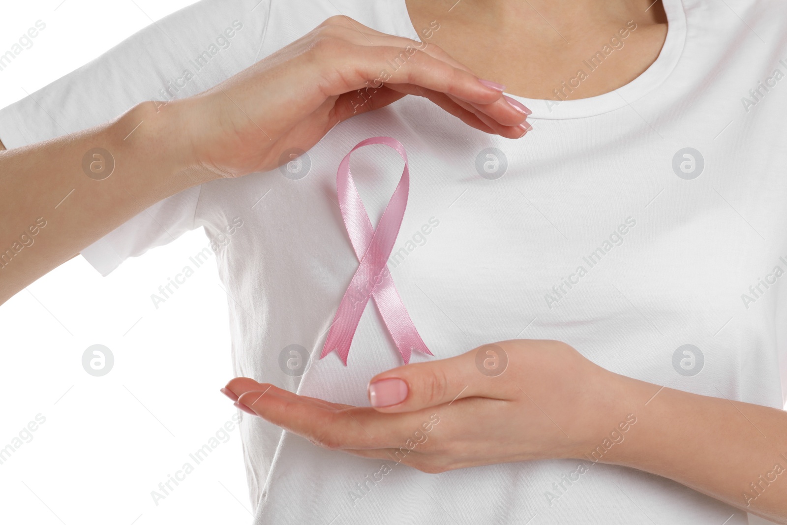 Photo of Woman with pink ribbon on white background, closeup. Breast cancer awareness