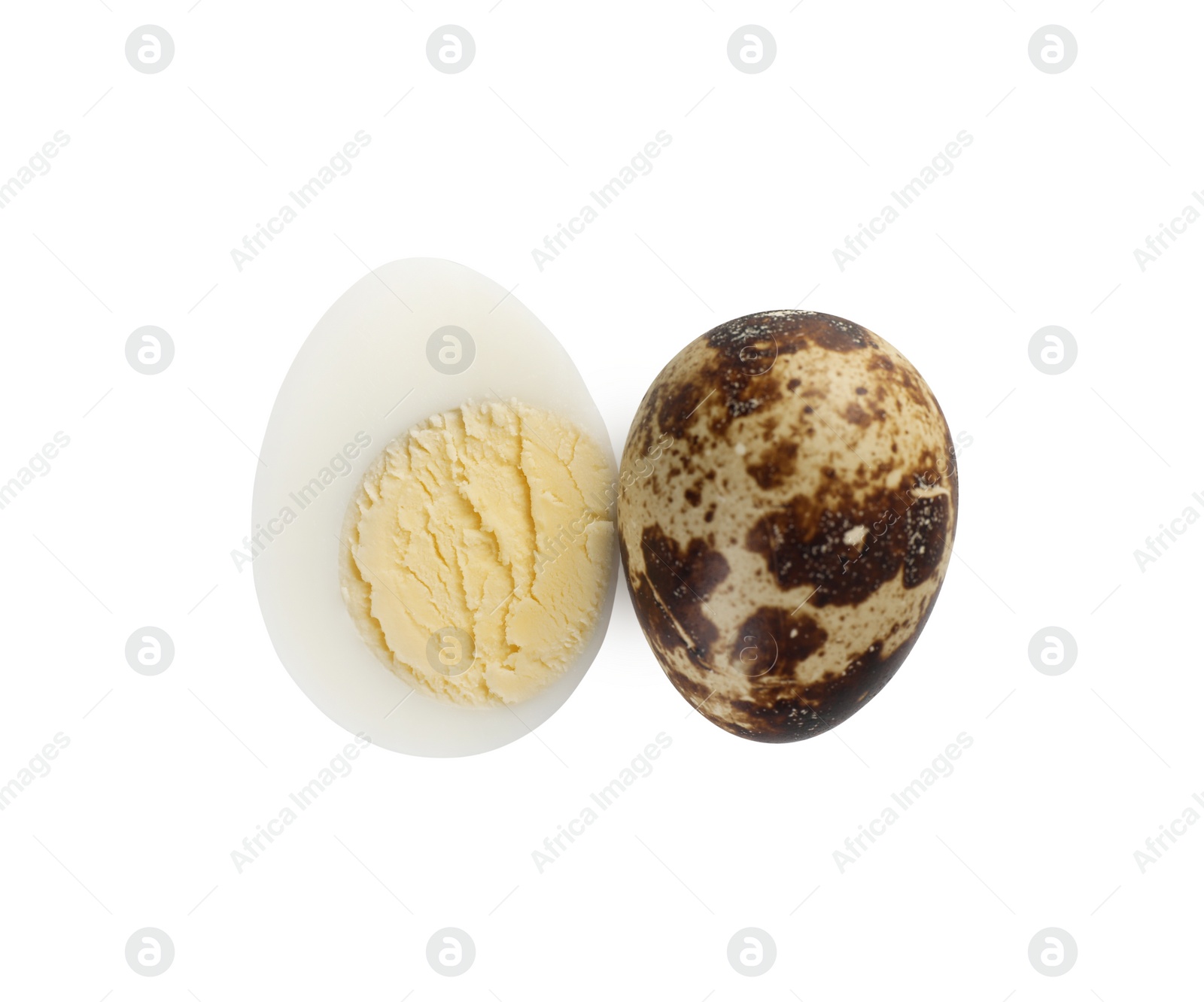 Photo of Unpeeled and peeled hard boiled quail eggs on white background, top view