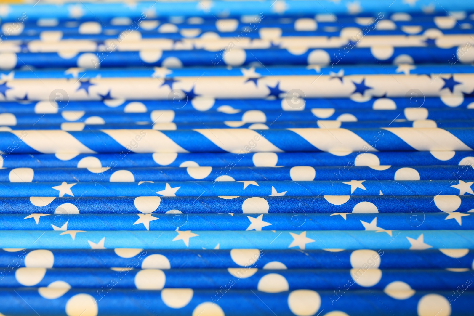 Photo of Many paper drinking straws as background, closeup