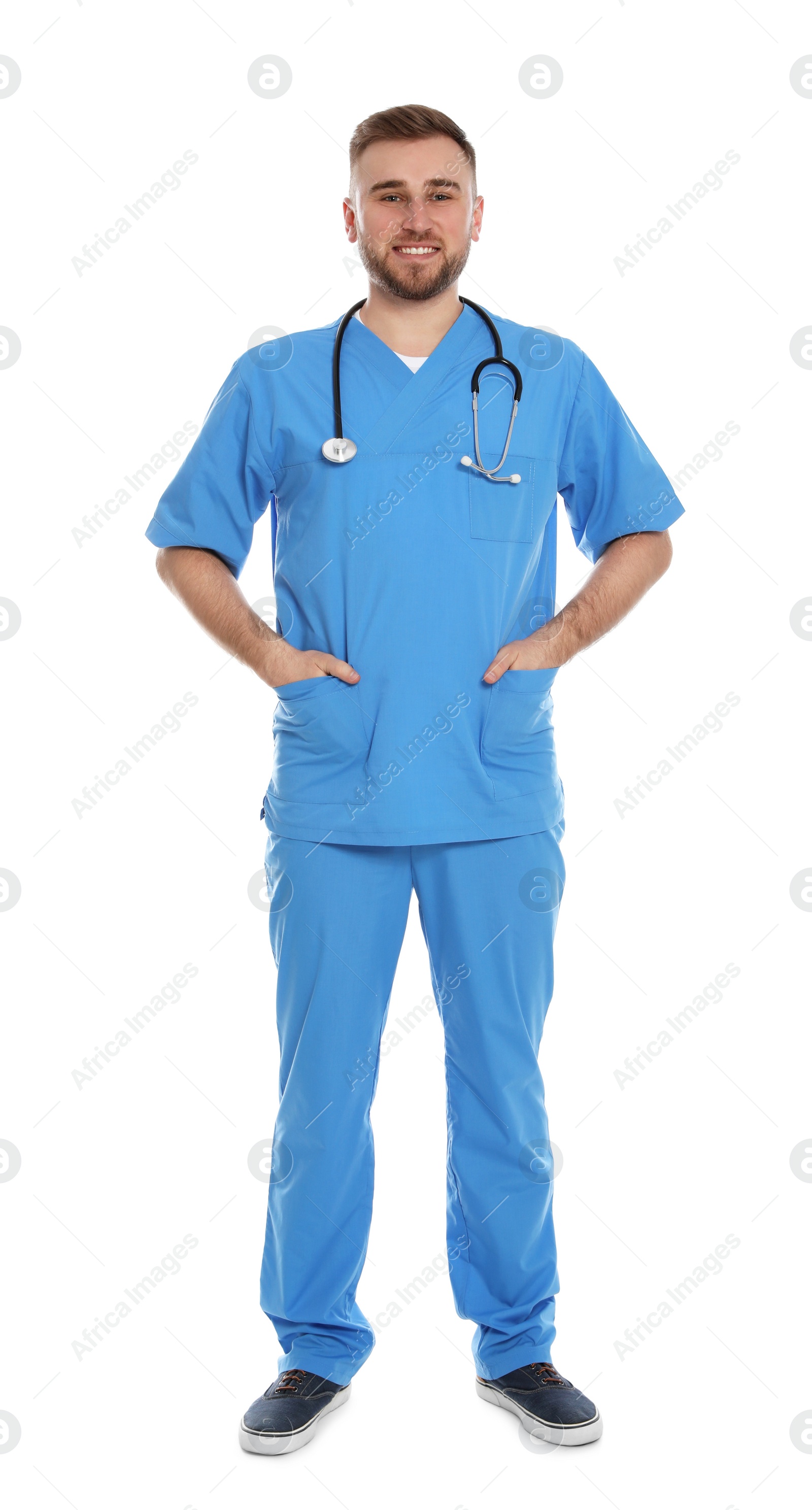 Photo of Full length portrait of medical doctor with stethoscope isolated on white