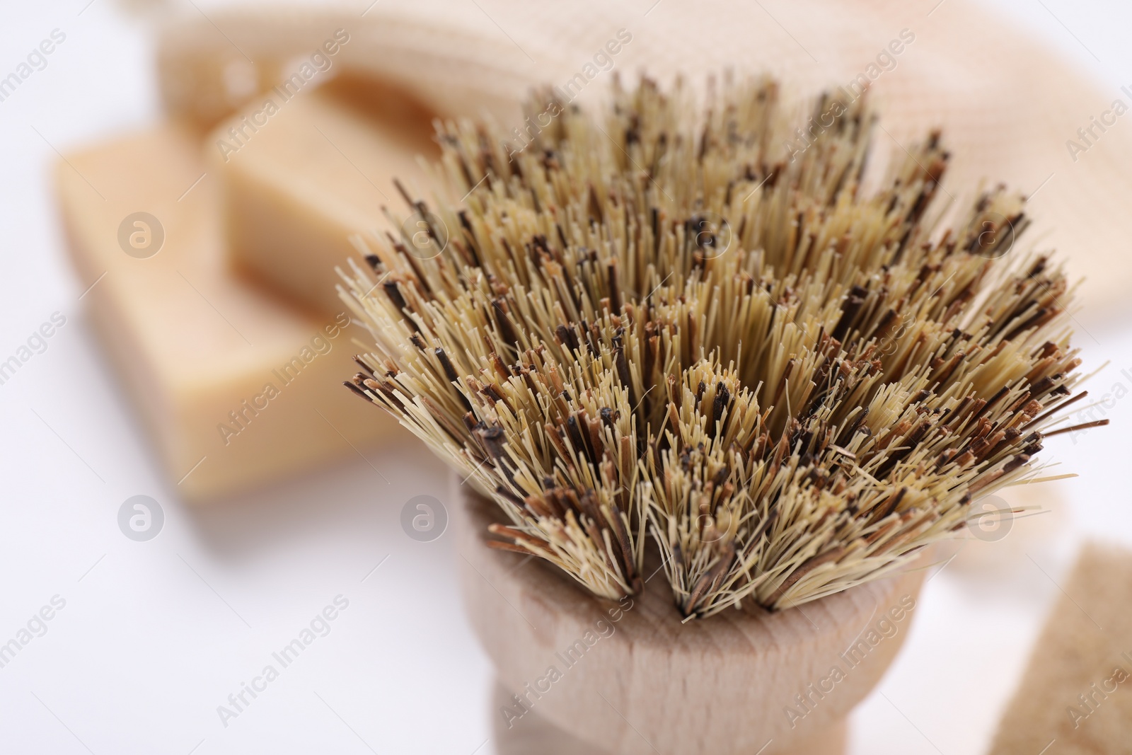 Photo of Cleaning brush on white background, closeup view