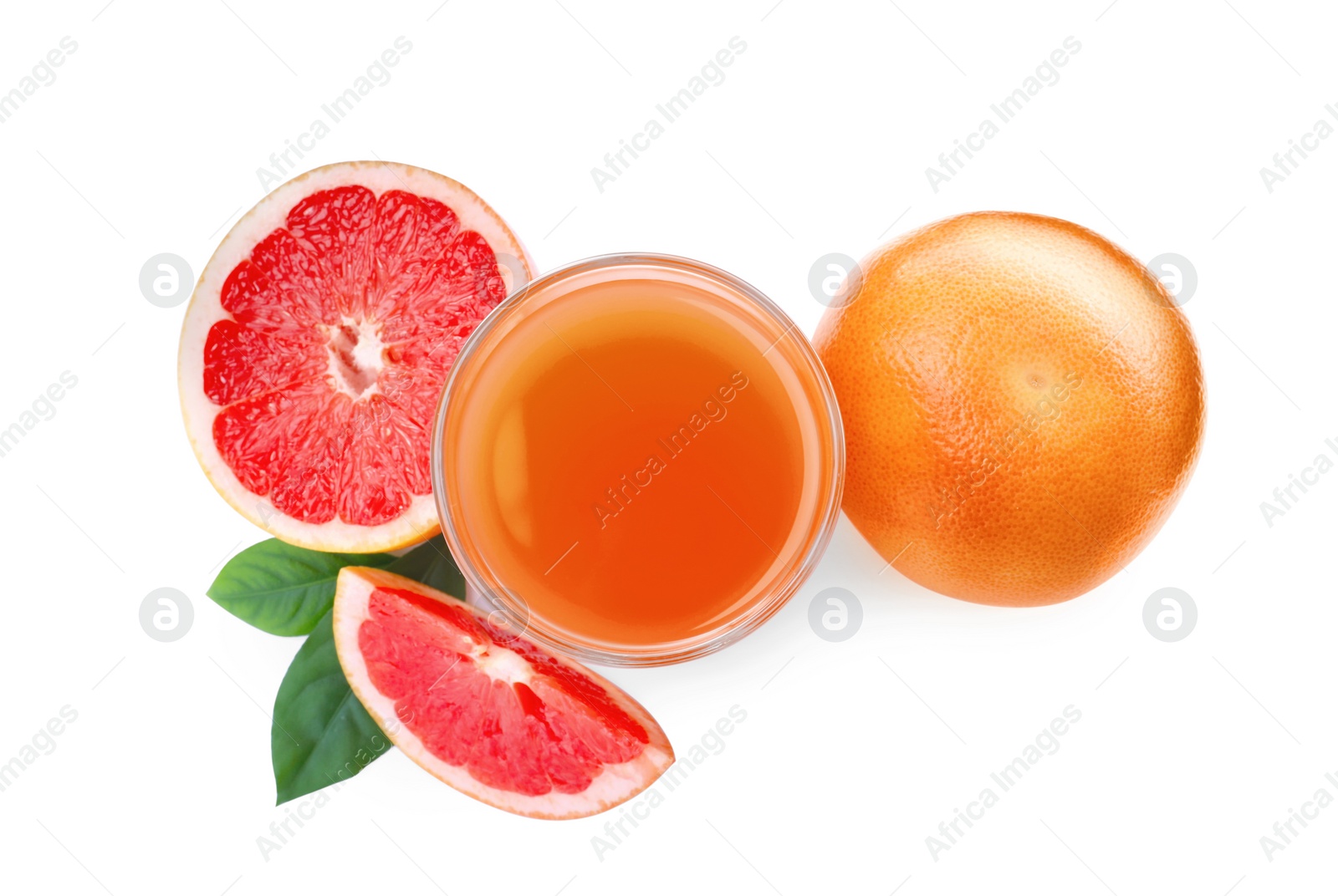 Photo of Tasty freshly made grapefruit juice and fruits on white background, top view