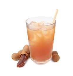 Photo of Glass of tamarind juice and fresh fruits isolated on white
