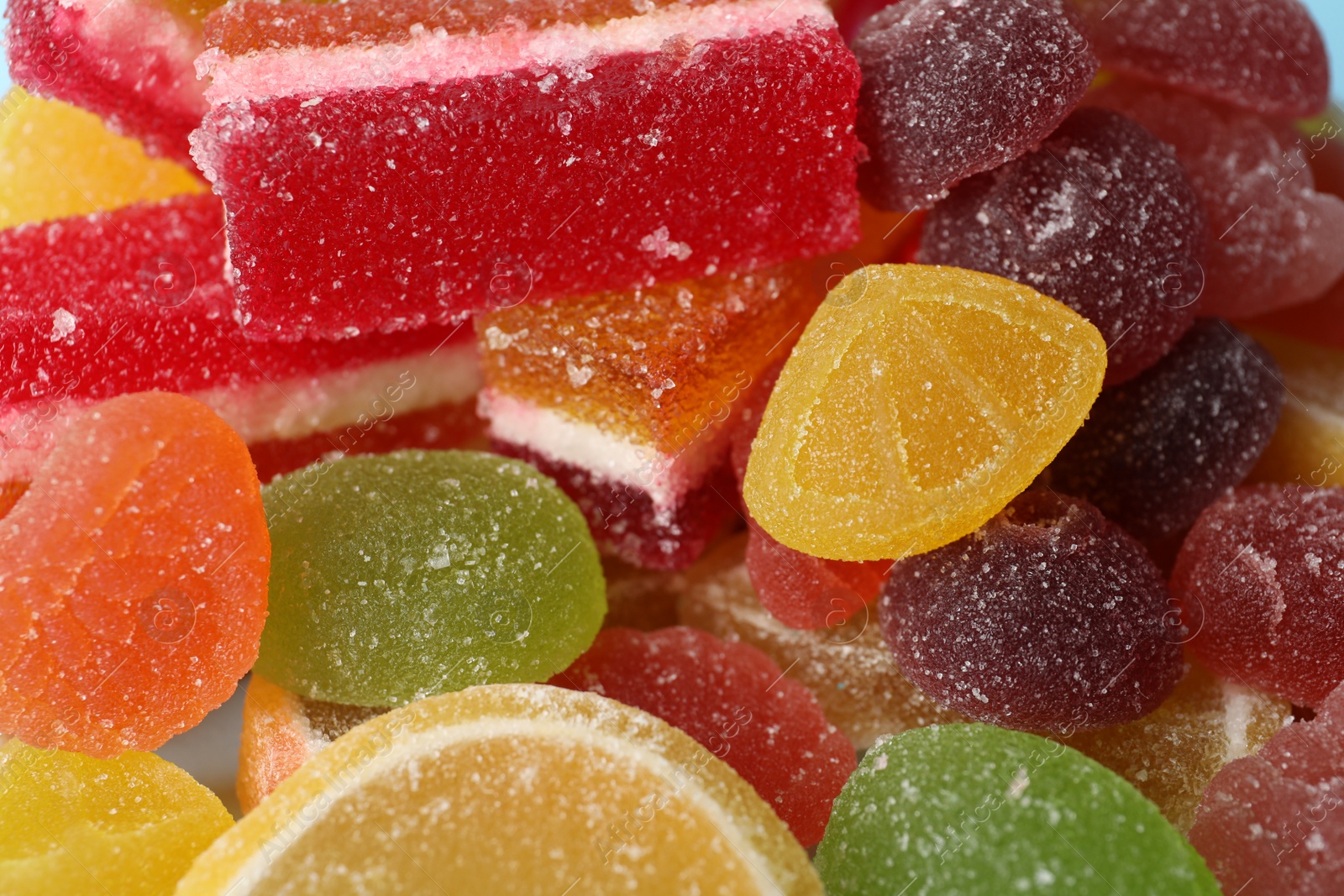 Photo of Delicious bright jelly candies as background, closeup