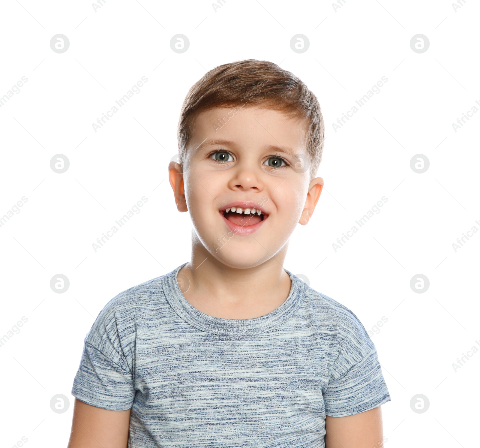 Photo of Portrait of little boy laughing on white background