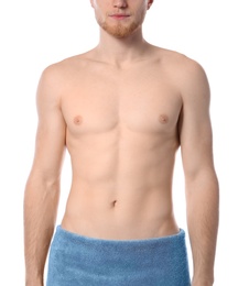 Young man with slim body in towel on white background, closeup