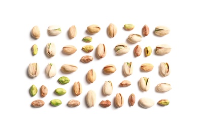 Photo of Composition with organic pistachio nuts on white background, top view