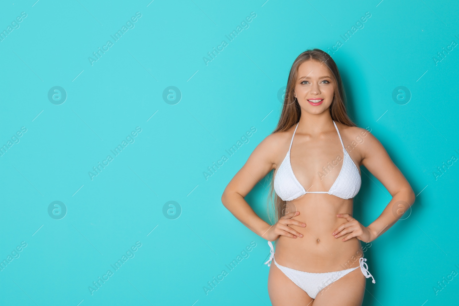 Photo of Beautiful woman wearing bikini on color background