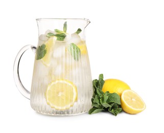 Freshly made lemonade with mint in jug isolated on white