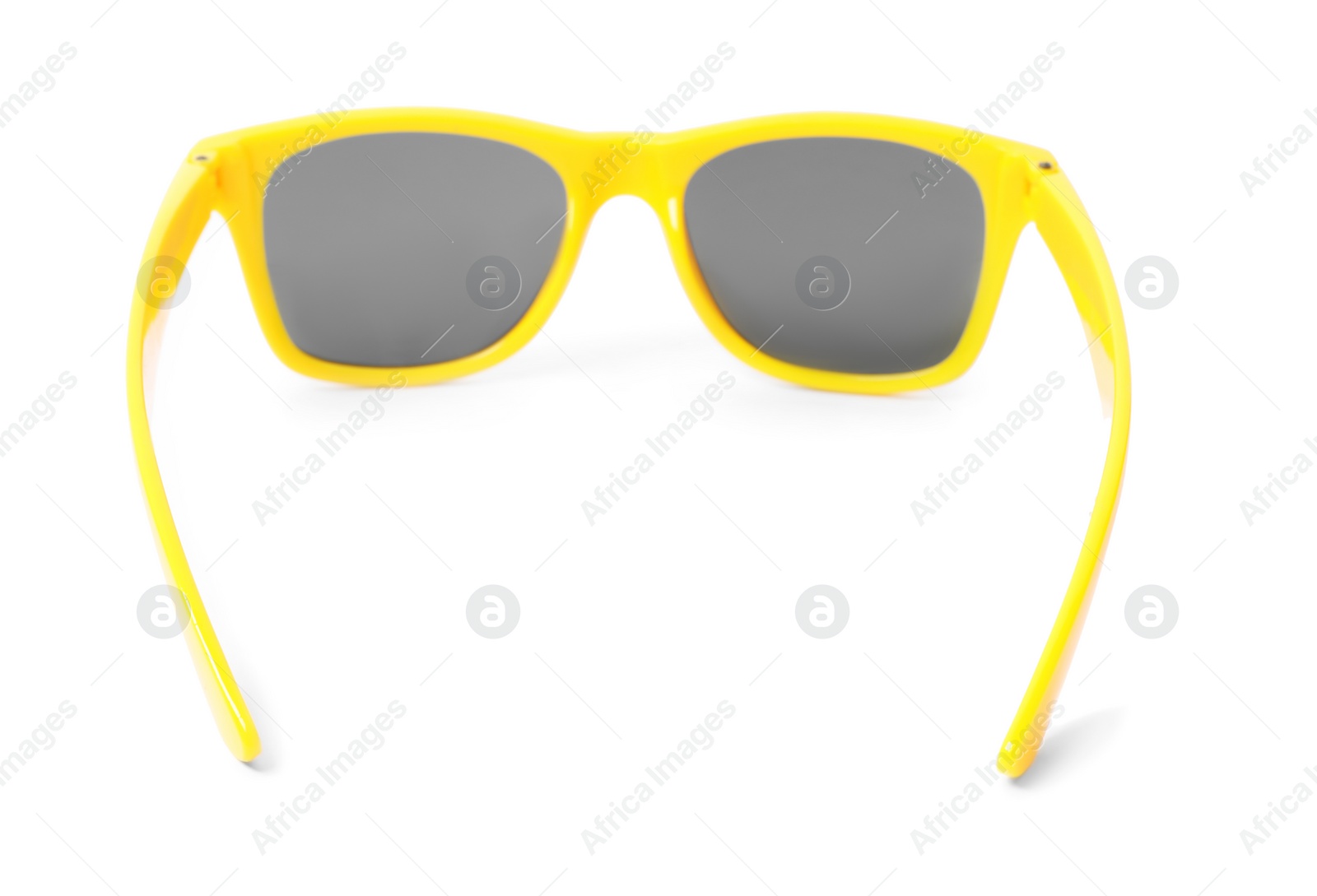 Photo of Beautiful sunglasses on white background. Beach object