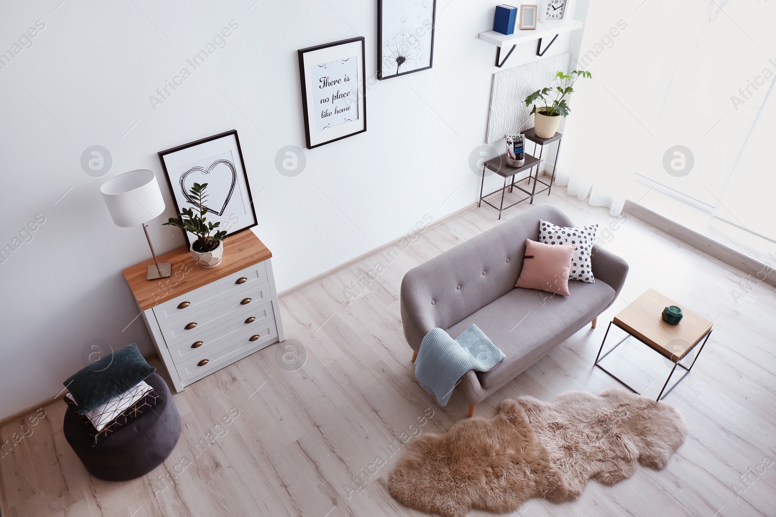 Photo of Living room interior with comfortable sofa, view through CCTV camera