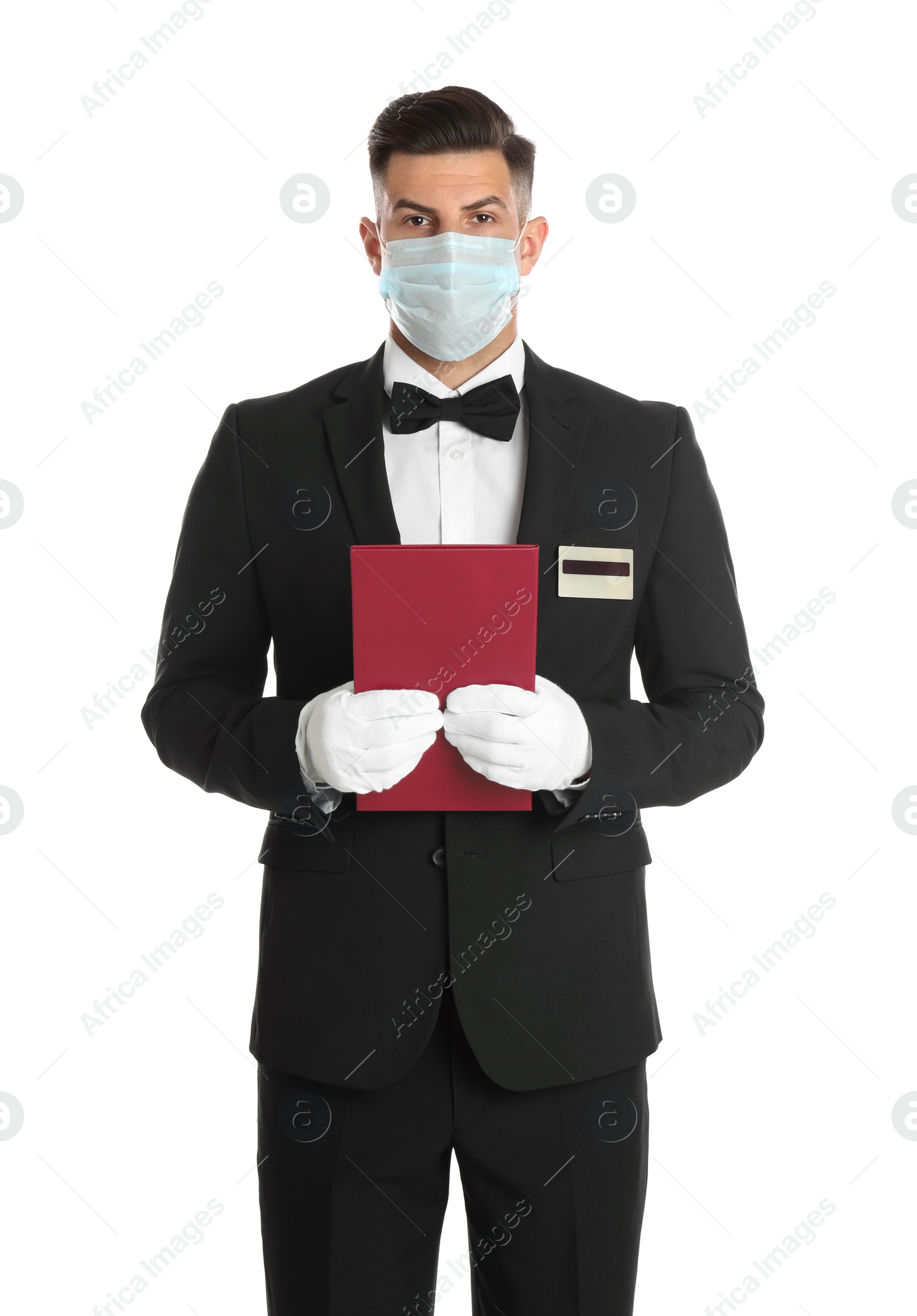 Photo of Waiter in medical face mask with menu on white background