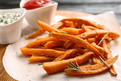 Photo of Closeup view of board with sweet potato fries