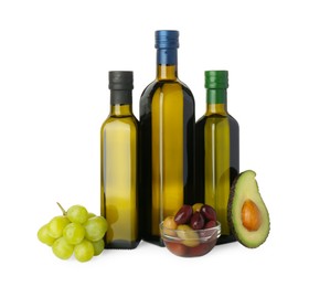 Vegetable fats. Bottles of different cooking oils and ingredients isolated on white