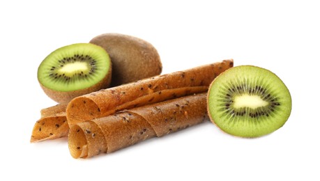 Photo of Delicious fruit leather rolls and kiwis on white background