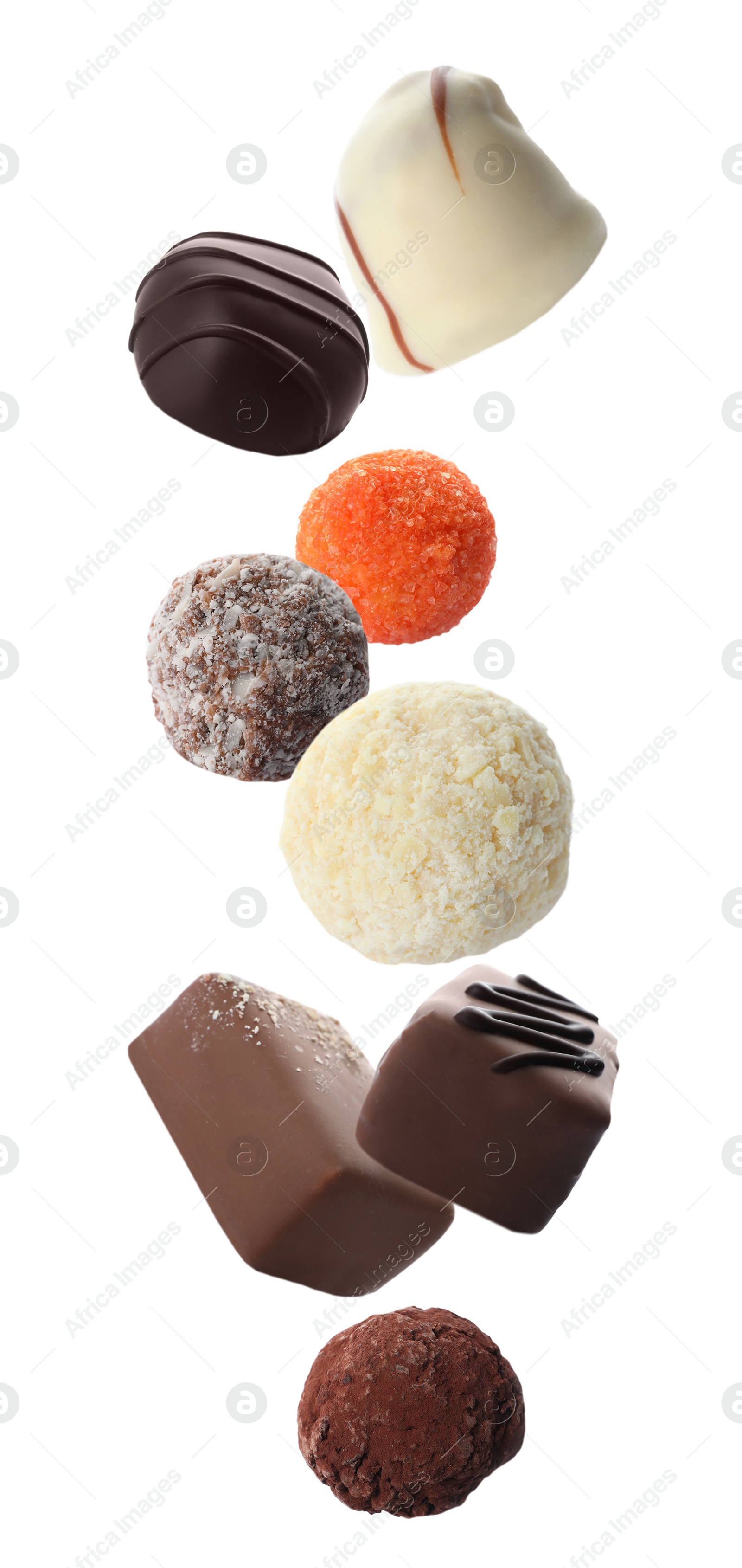 Image of Different chocolate candies falling on white background