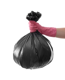 Photo of Woman holding plastic bag full of garbage on white background, closeup