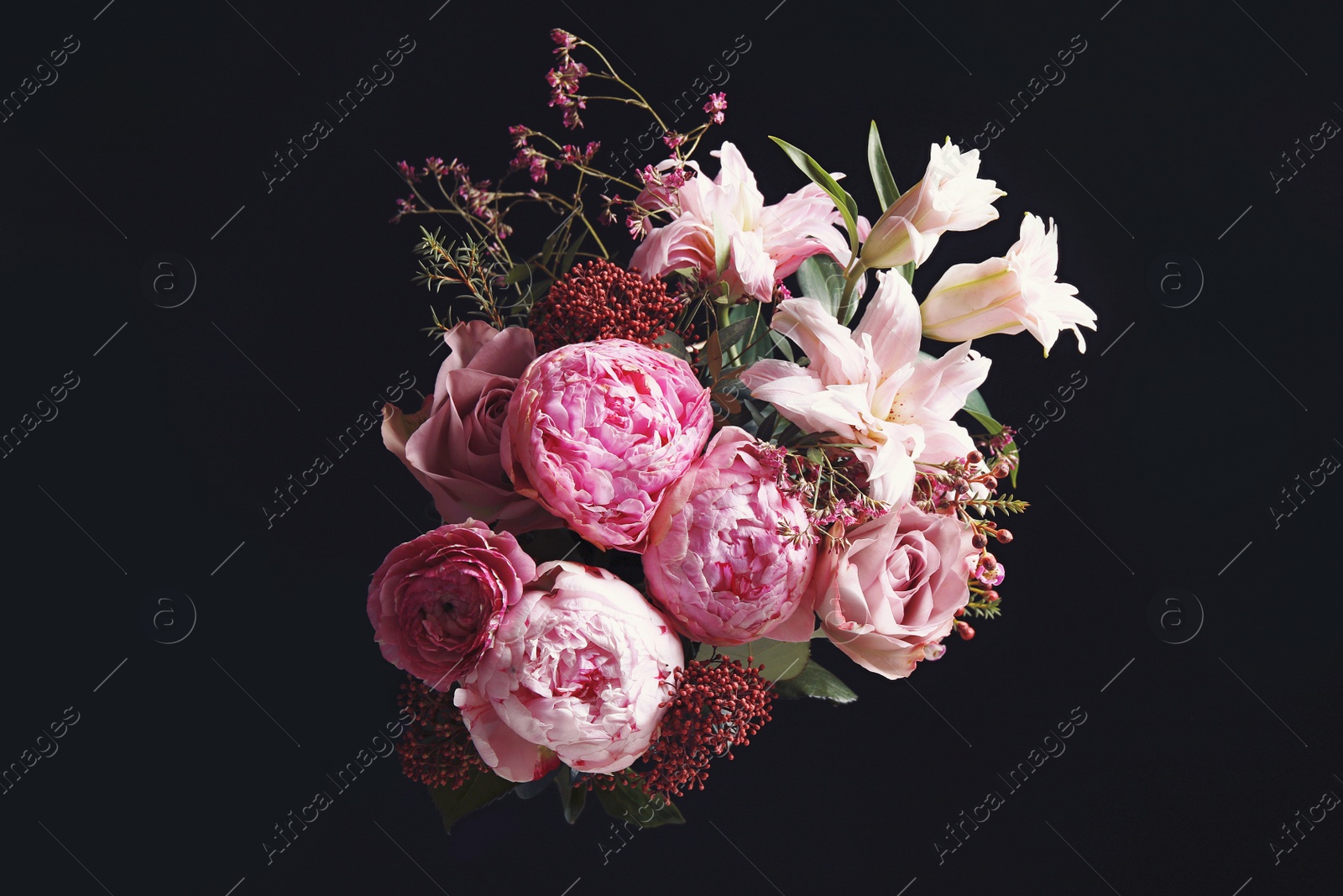 Photo of Beautiful bouquet of different flowers on black background. Floral card design with dark vintage effect