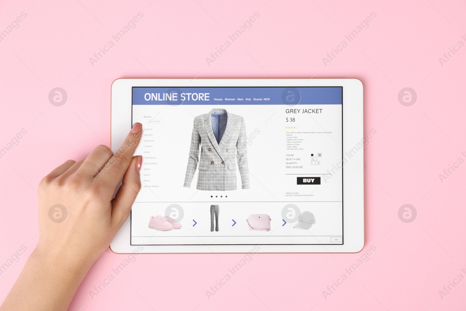 Photo of Woman with tablet shopping online on pink background, top view