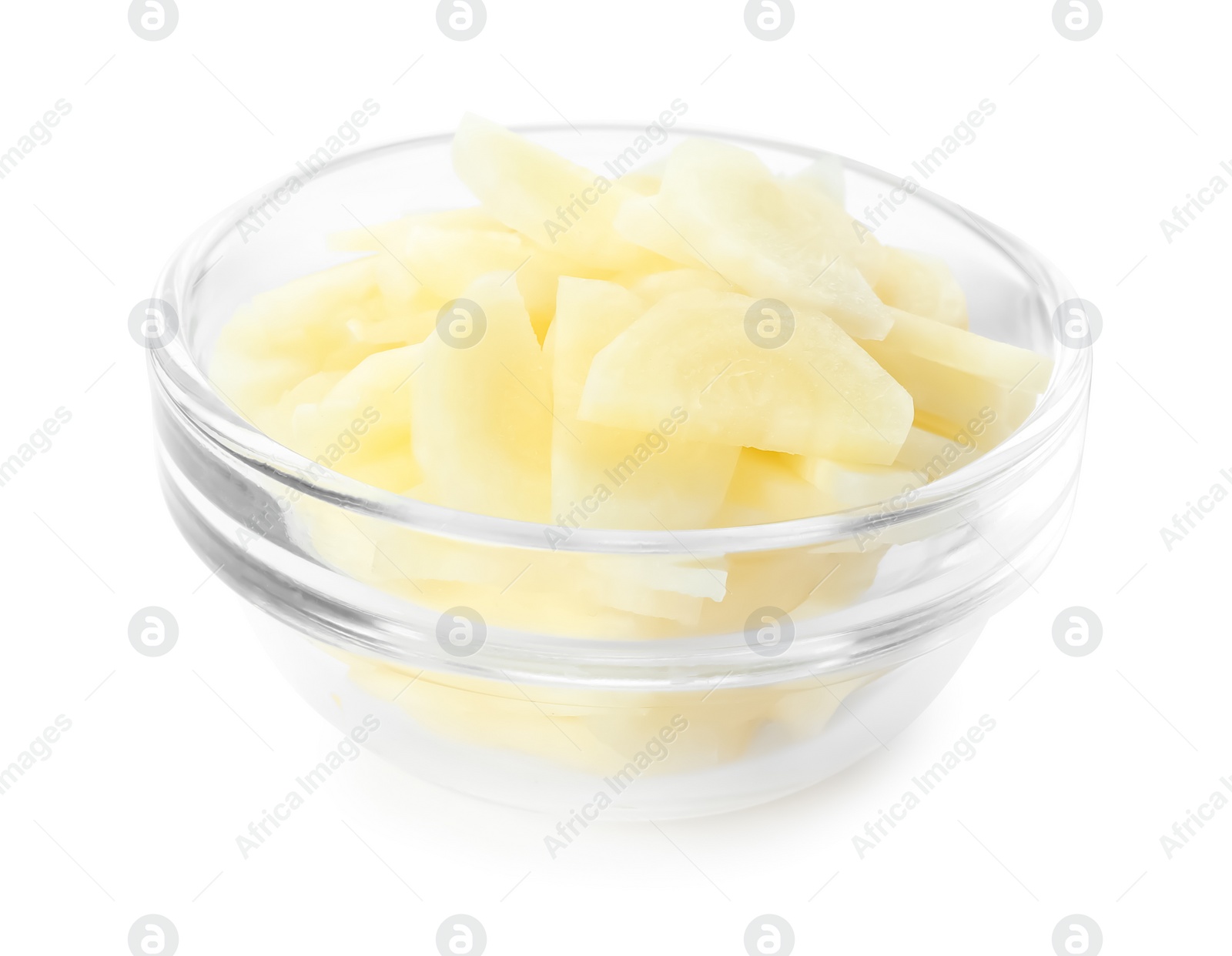 Photo of Pieces of raw carrot in glass bowl isolated on white