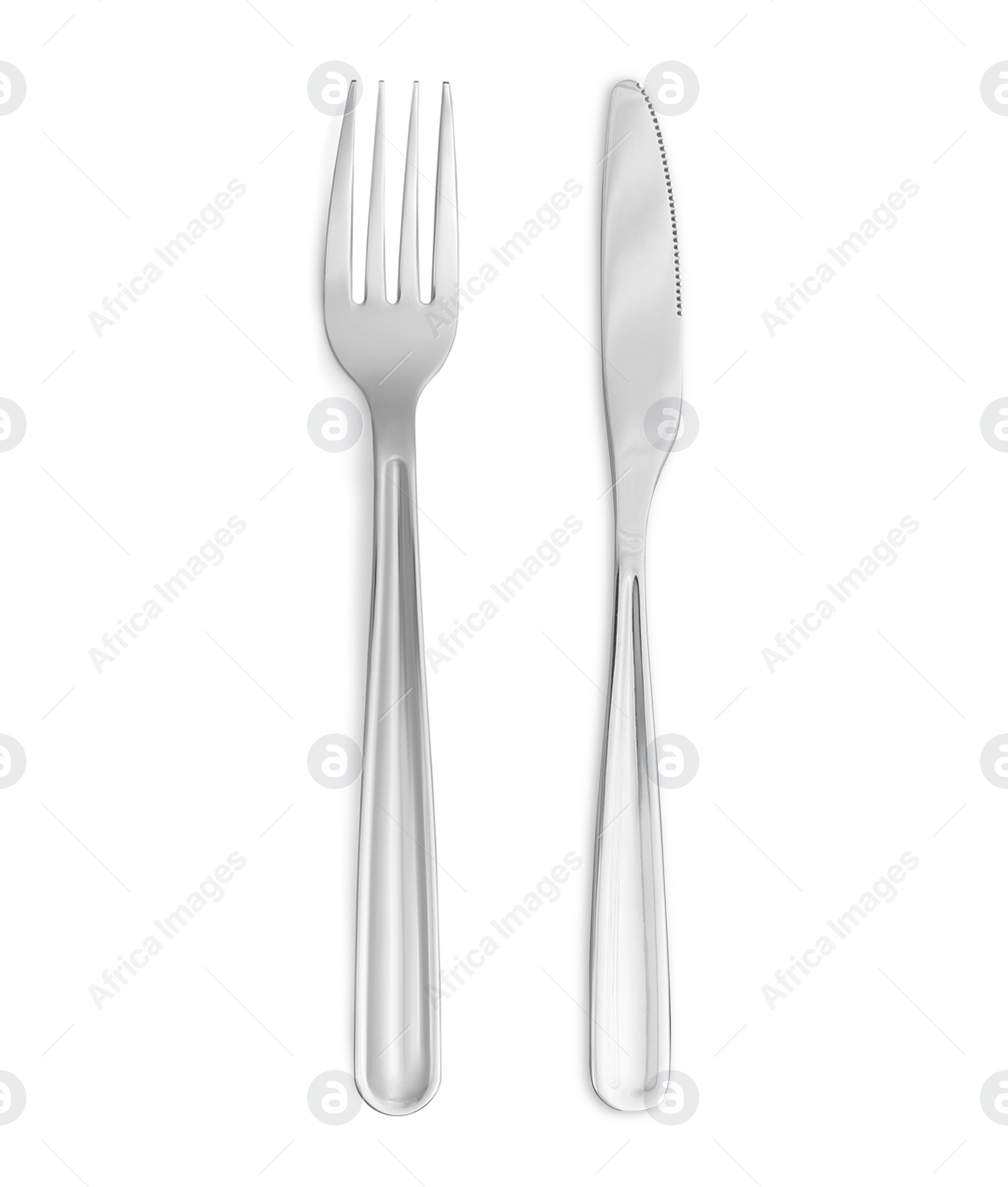 Image of Shiny silver knife and fork on white background, top view