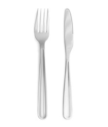 Image of Shiny silver knife and fork on white background, top view