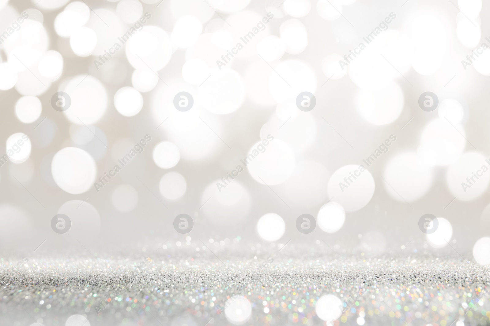 Image of Shiny silver glitter as background. Bokeh effect