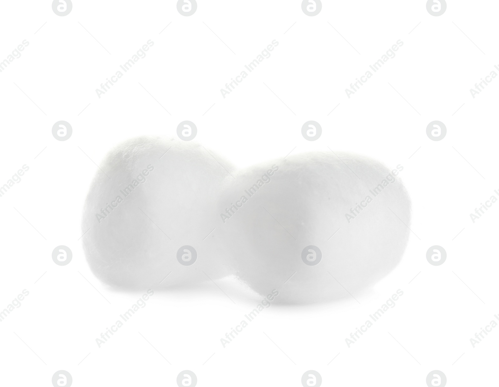 Photo of Balls of fluffy cotton on white background