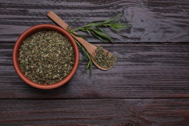 Photo of Dry and fresh tarragon on wooden table, flat lay. Space for text