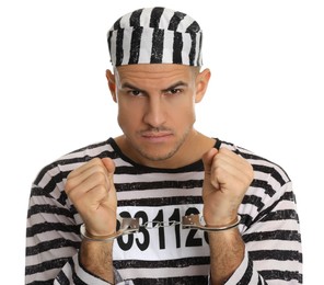 Prisoner in striped uniform with handcuffs on white background
