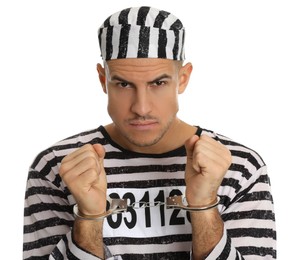 Photo of Prisoner in striped uniform with handcuffs on white background