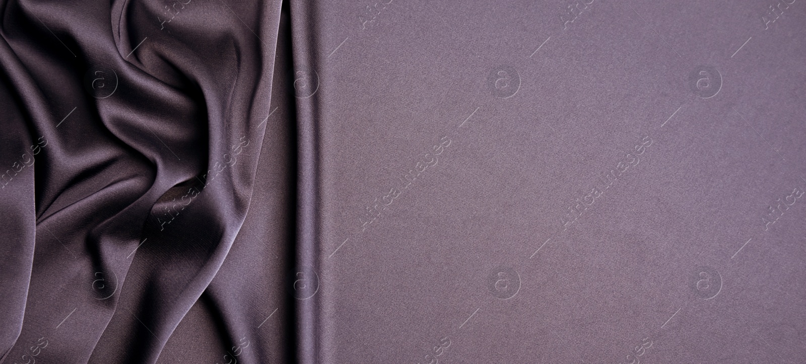 Image of Dark purple silk fabric as background, top view with space for text. Banner design