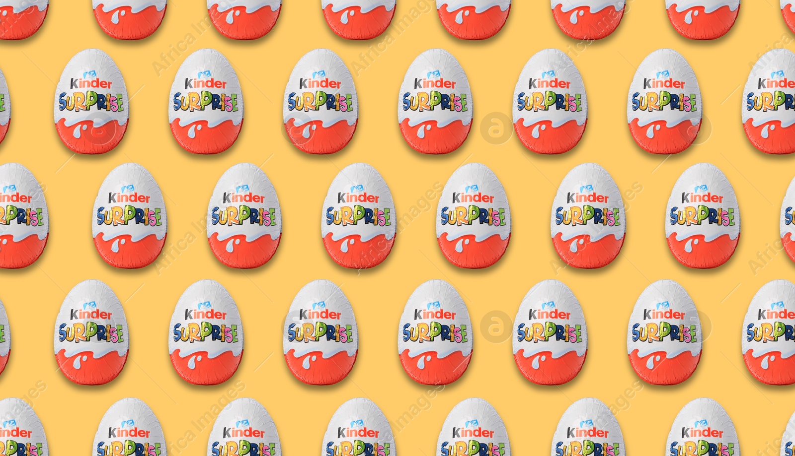 Image of Mykolaiv, Ukraine - June 26, 2023: Kinder Surprise Egg on yellow background, seamless pattern design
