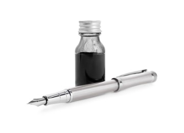 Photo of Stylish silver fountain pen and inkwell isolated on white