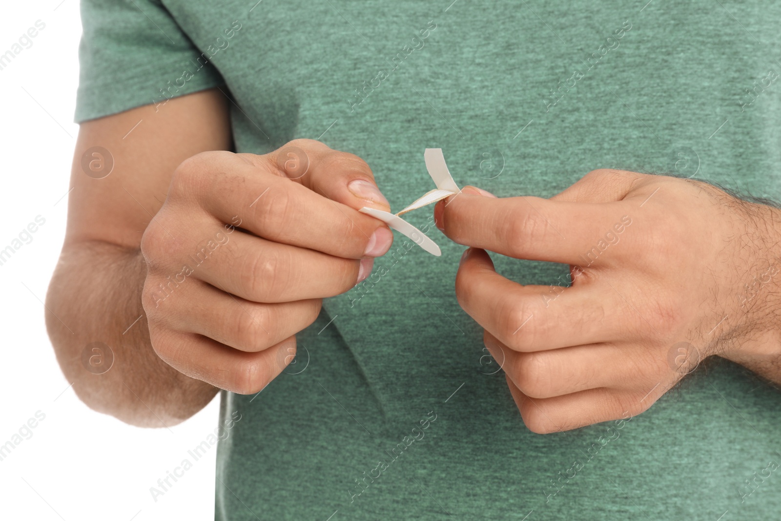 Photo of Man with sticking plaster on white background, closeup