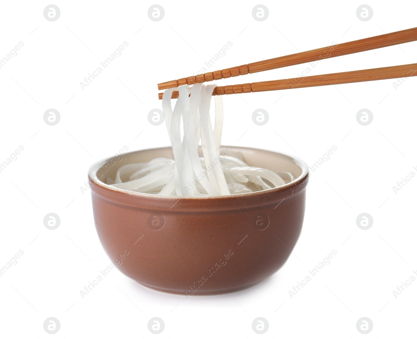 Photo of Bowl of cooked rice noodles and chopsticks isolated on white