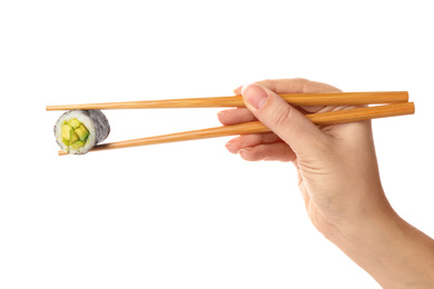 Photo of Woman holding sushi roll on white background, closeup