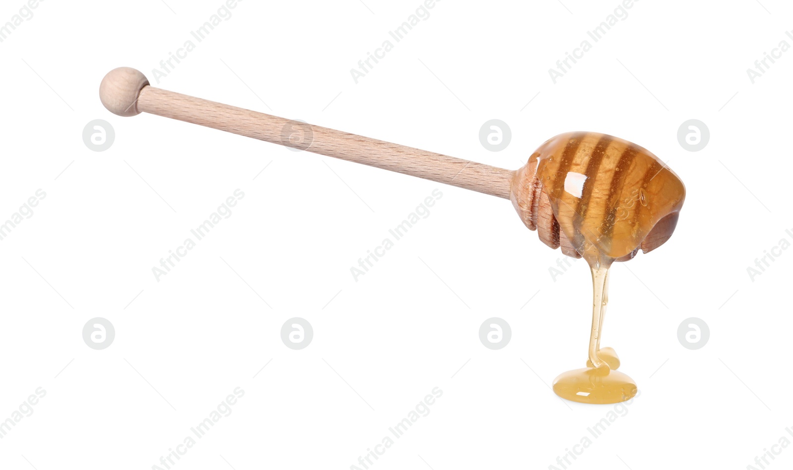 Photo of Natural honey dripping from dipper on white background