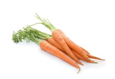 Photo of Ripe fresh carrots on white background