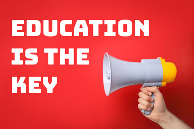 Image of Phrase EDUCATION IS THE KEY and man with megaphone on red background, closeup. Adult learning