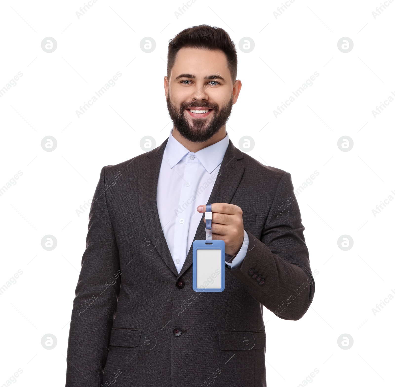 Photo of Happy young man with blank badge isolated on white