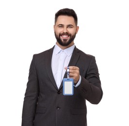 Happy young man with blank badge isolated on white