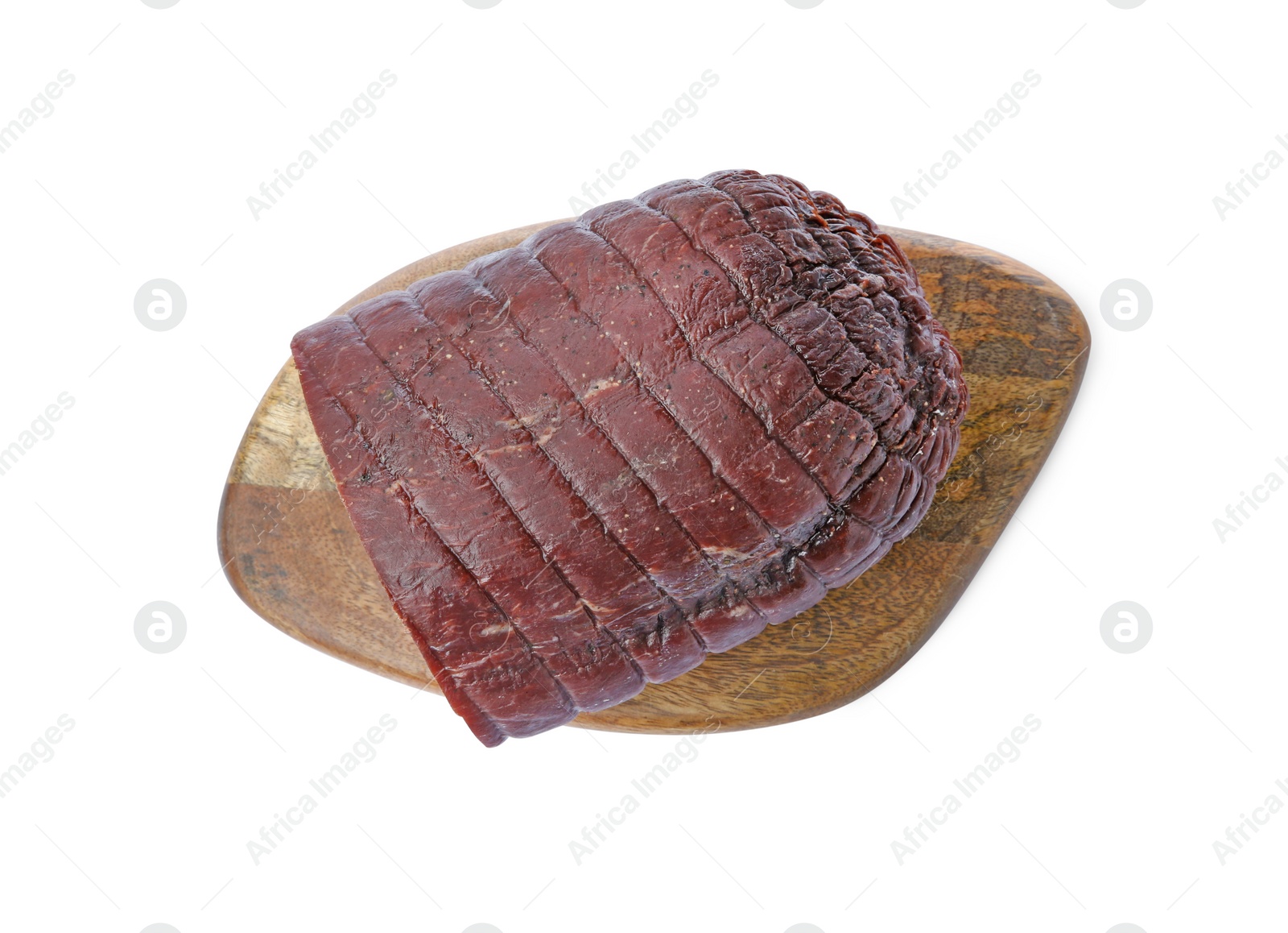 Photo of Tasty fresh dry bresaola isolated on white, top view