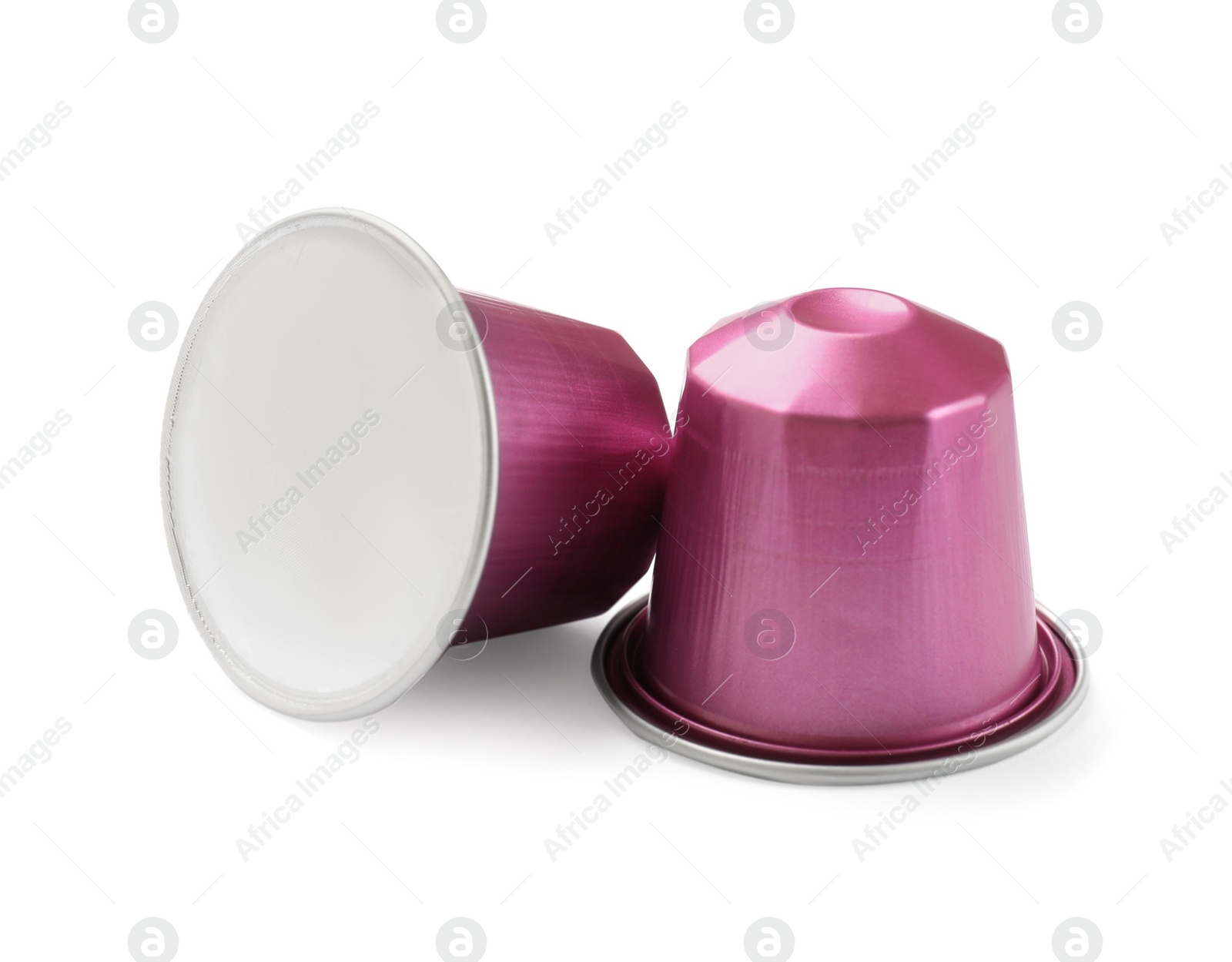 Photo of Two plastic coffee capsules isolated on white