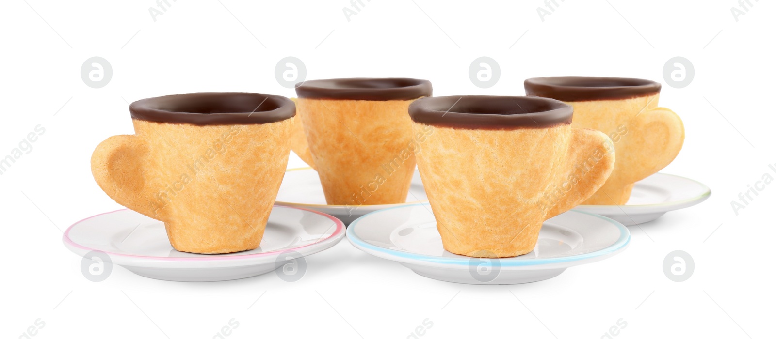 Photo of Edible espresso cookie cups and saucers isolated on white