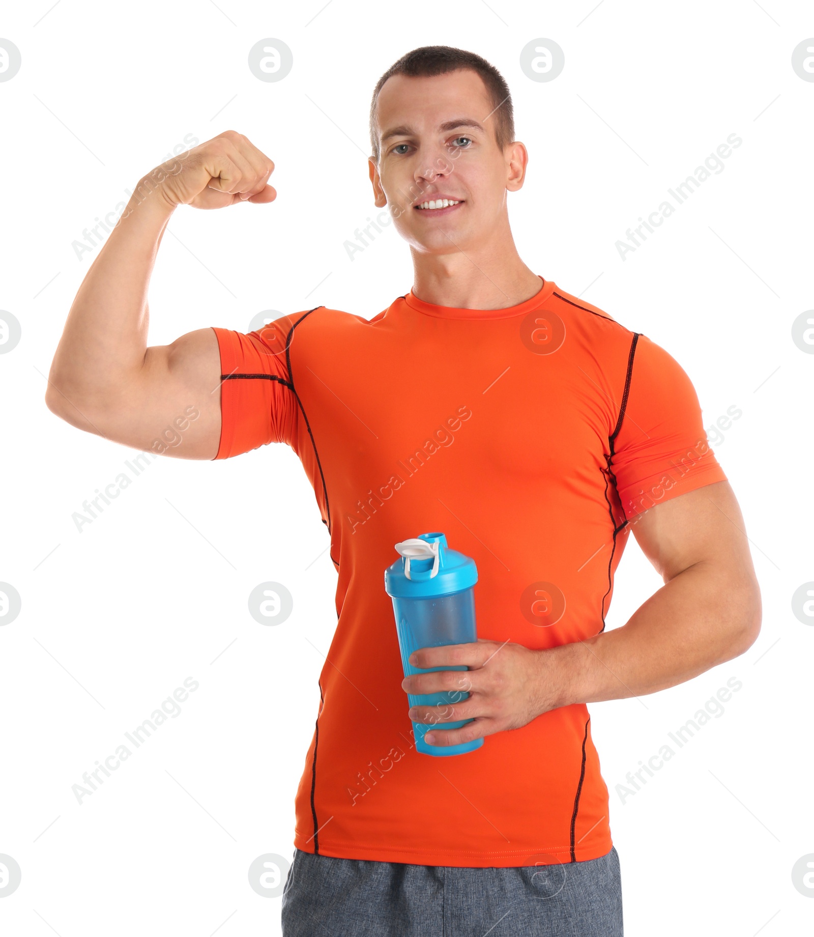 Photo of Athletic young man with protein shake on white background