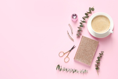 Photo of Flat lay composition with scissors, coffee and notebook on pink background. Space for text