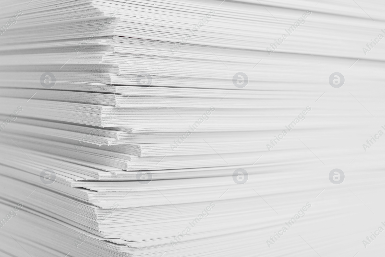 Photo of Stack of white paper sheets, closeup view