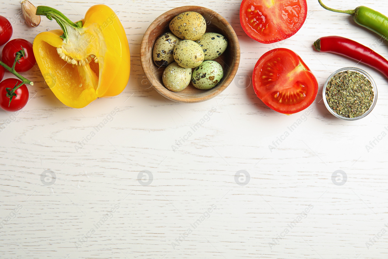 Photo of Flat lay composition with ingredients for cooking on white wooden table. Space for text