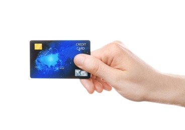 Young man holding credit card on white background